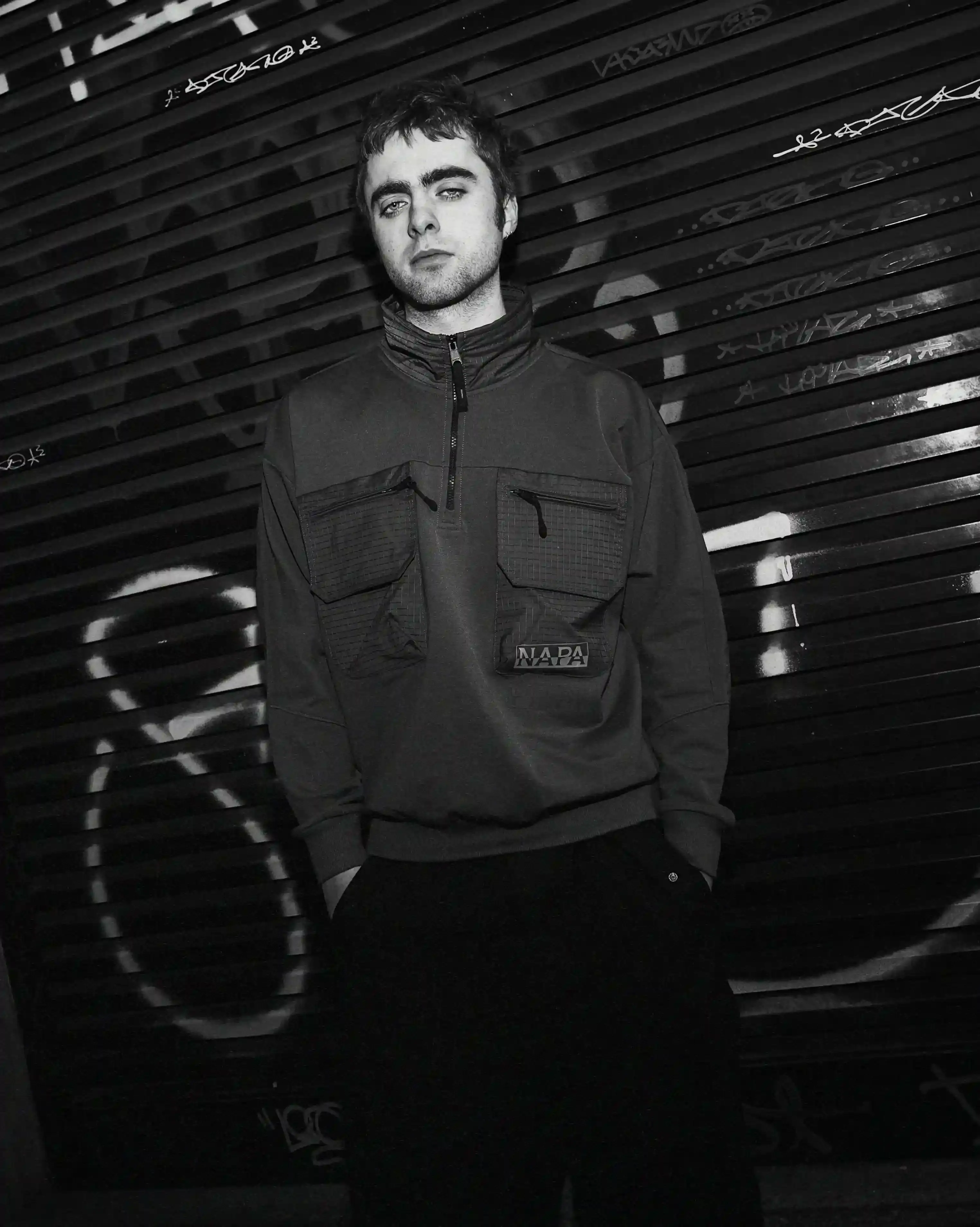 © Casawi | Matteo Vetrano image of Lennon Gallagher, featuring a Q&A format discussion about his modeling work with Napapijri, his band activities, daily routines, and personal influences including David Bowie. The article reveals his casual approach to life, balancing music practice with modeling, and his preference for a laid-back lifestyle. shoot by Matteo Vetrano (image 2 of 13)