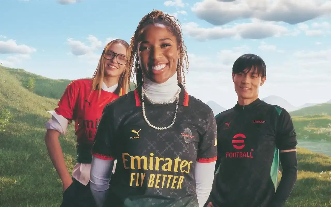 AC Milan AC Milan's 2025 fourth kit collaboration with PUMA and Off-White™, showing two versions: a black to power green gradient jersey with yellow logos and red accents, and an alternate red to power green gradient jersey with monochromatic club crest and yellow details. Both feature Off-White™'s signature design elements including quotation marks and zip ties. The shirts display the 'Diavoli' nickname on the chest and incorporate a modified arrow pattern throughout. (image 3 of 13)