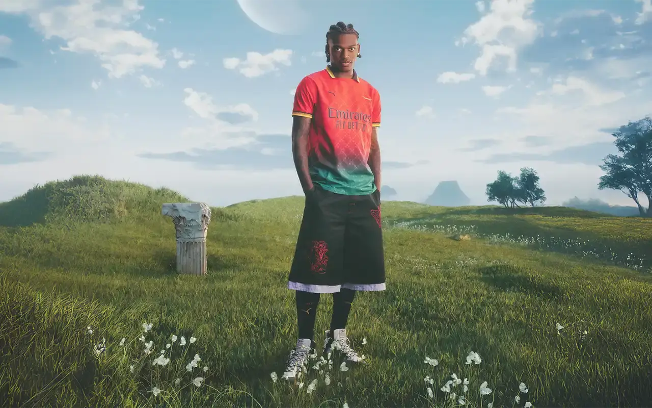 AC Milan AC Milan's 2025 fourth kit collaboration with PUMA and Off-White™, showing two versions: a black to power green gradient jersey with yellow logos and red accents, and an alternate red to power green gradient jersey with monochromatic club crest and yellow details. Both feature Off-White™'s signature design elements including quotation marks and zip ties. The shirts display the 'Diavoli' nickname on the chest and incorporate a modified arrow pattern throughout. (image 8 of 13)