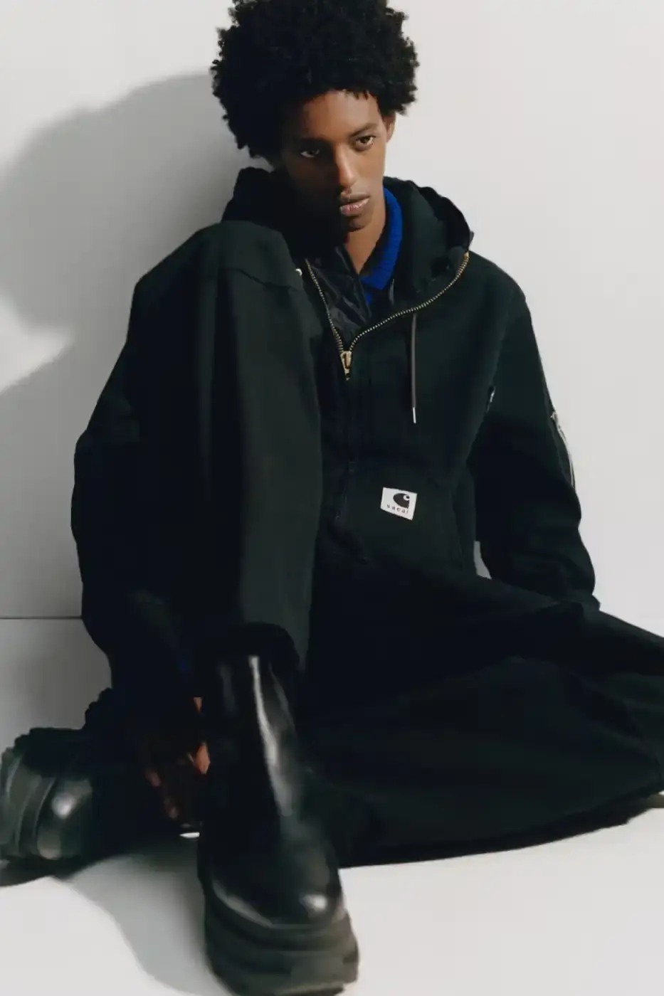 SACAI AND CARHARTT WIP LAUNCH THIRD COLLECTION image about the third collaboration between fashion brands sacai and Carhartt WIP, featuring details about their 19-piece collection launching October 3, 2025 (image 2 of 8)