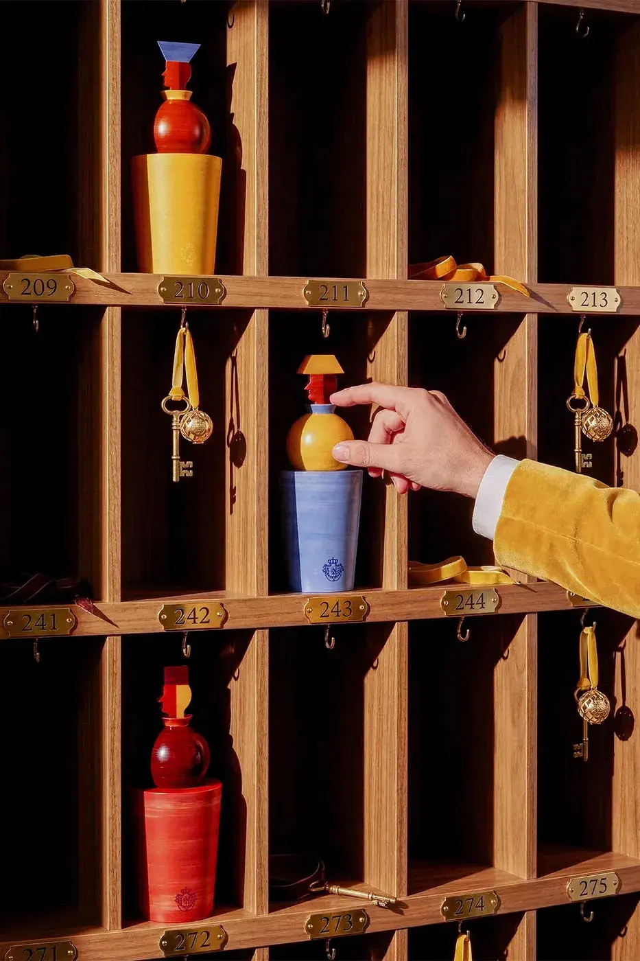 ACQUA DI PARMA HOLIDAY 2026 COLLECTION BY AGOSTINO IACURCI image about the Acqua di Parma Holiday 2026 collection designed with artist Agostino Iacurci. The article covers the Grand Hotel Sprezzatura theme, limited edition ceramics, home fragrances, the Advent Calendar and two Art of Living objects, with prices in dollars and euros. (image 5 of 6)