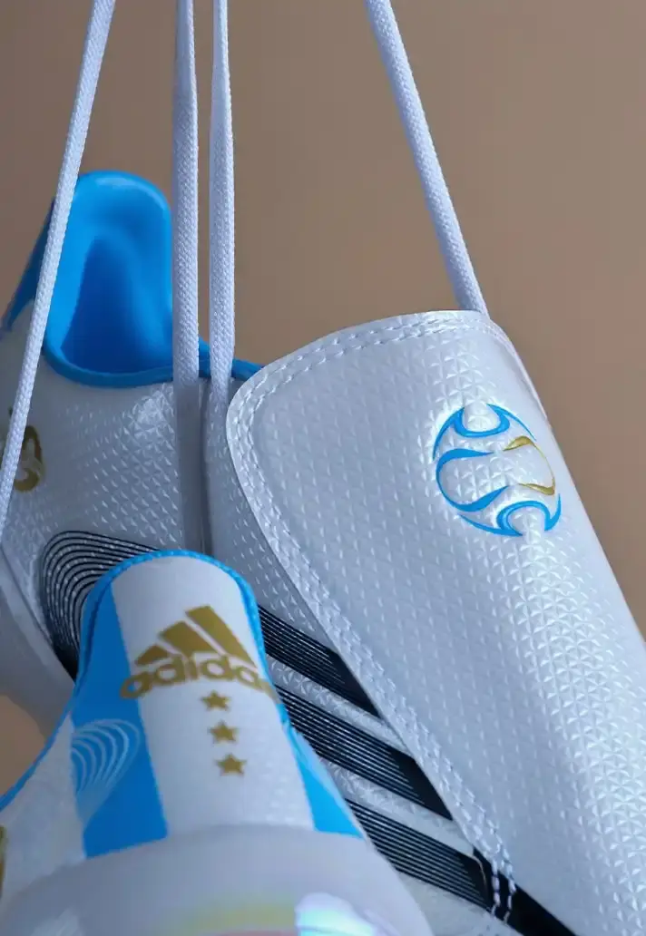 ADIDAS F50 TUNIT RETURNS WITH MESSI TRIBUTE image about adidas releasing a remake of the F50 TUNiT football boot, inspired by Lionel Messi's 2006 World Cup footwear, combining vintage design with contemporary technology. (image 5 of 6)