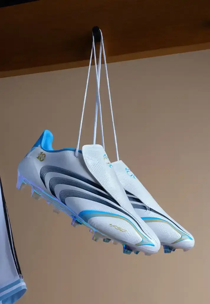 ADIDAS F50 TUNIT RETURNS WITH MESSI TRIBUTE image about adidas releasing a remake of the F50 TUNiT football boot, inspired by Lionel Messi's 2006 World Cup footwear, combining vintage design with contemporary technology.