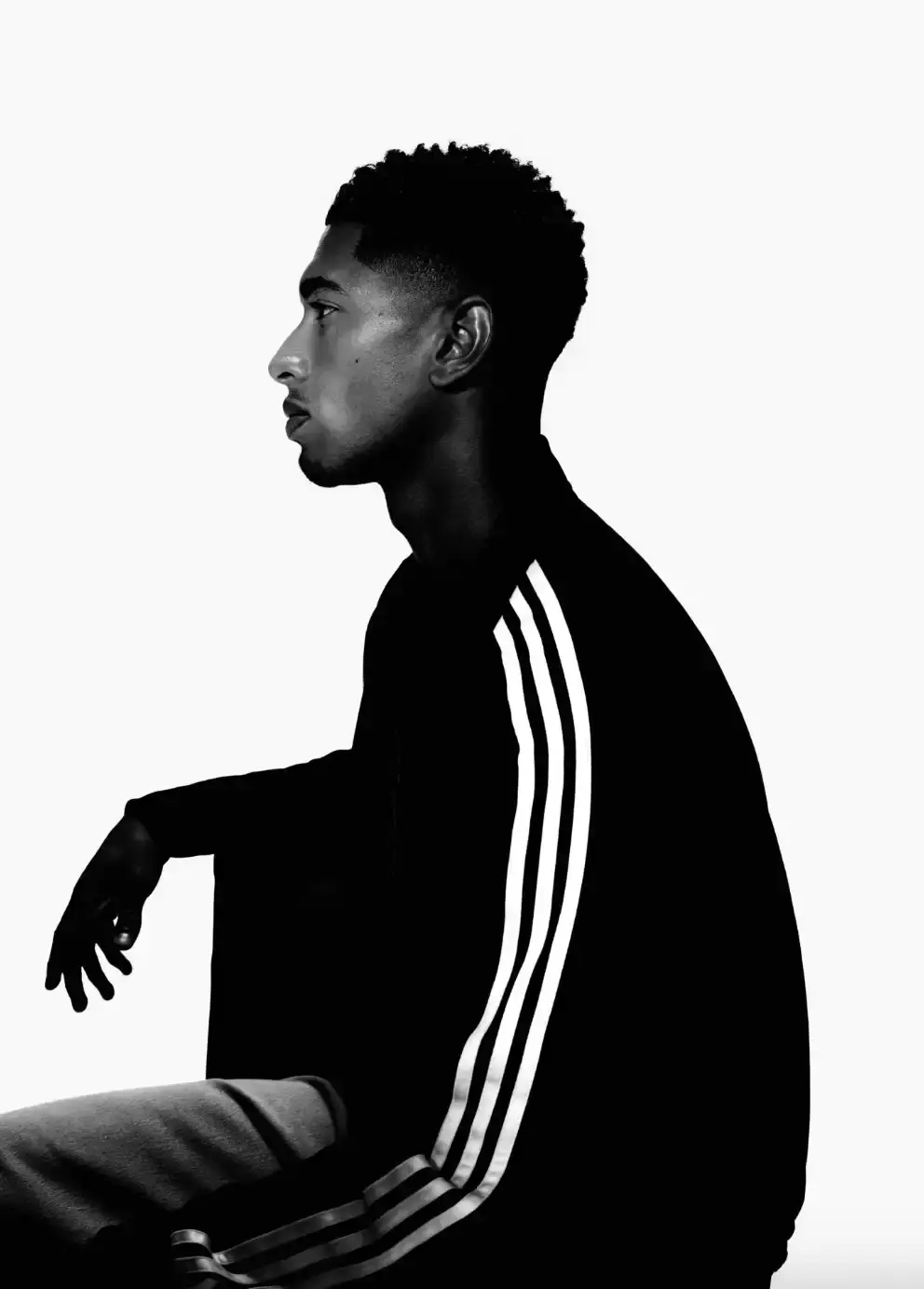 ADIDAS SUPERSTAR CAMPAIGN STARS STORMZY, BELLINGHAM, KEOGHAN image covers Adidas campaign featuring celebrities wearing iconic Superstar sneakers and Firebird tracksuits in black and white photography. (image 18 of 18)
