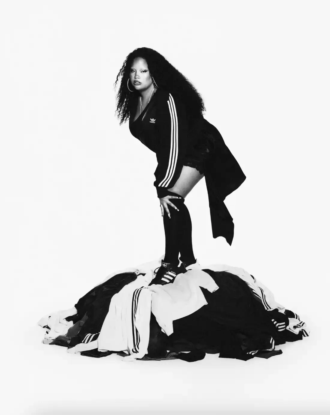 ADIDAS SUPERSTAR CAMPAIGN STARS STORMZY, BELLINGHAM, KEOGHAN image covers Adidas campaign featuring celebrities wearing iconic Superstar sneakers and Firebird tracksuits in black and white photography. (image 7 of 18)