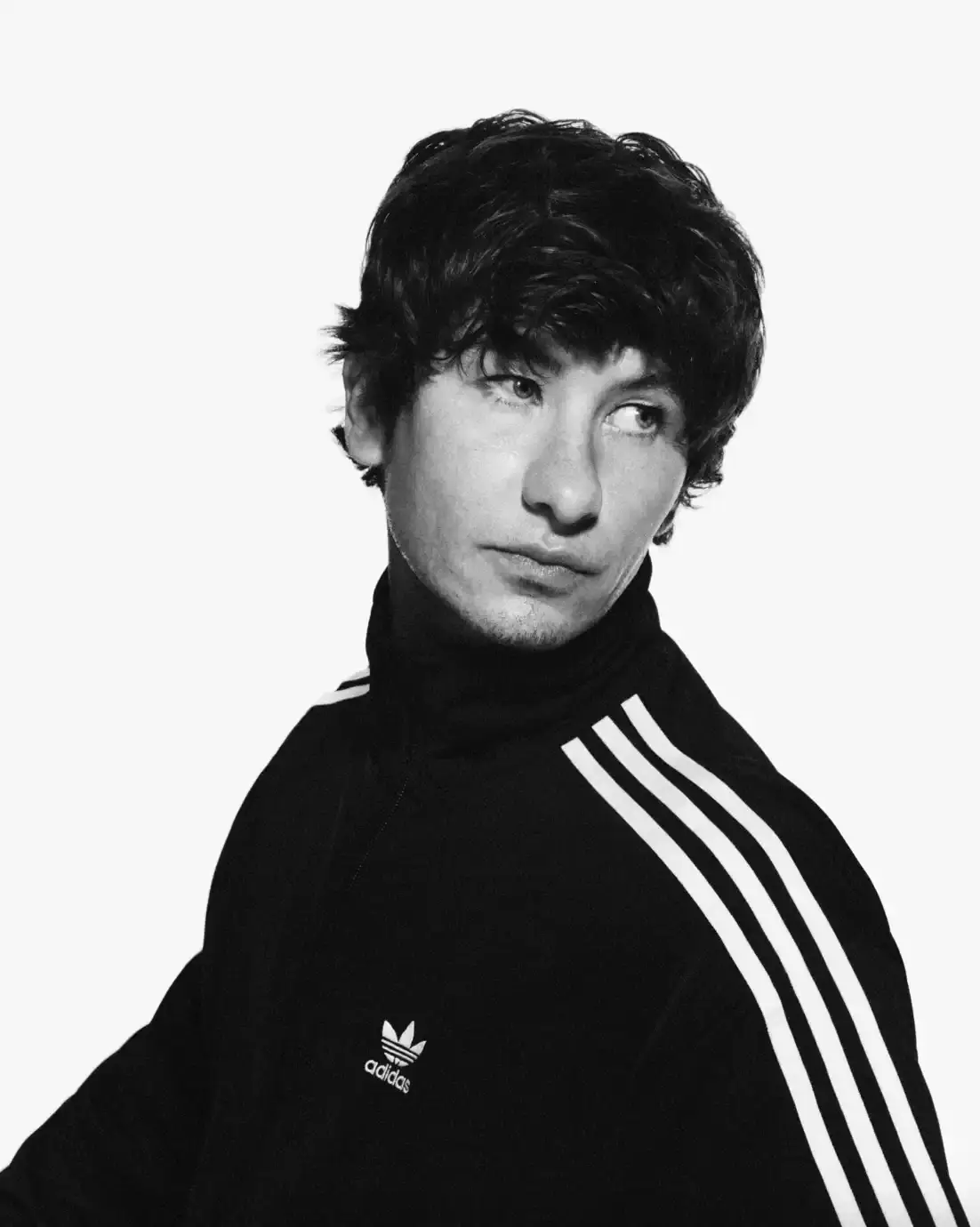 ADIDAS SUPERSTAR CAMPAIGN STARS STORMZY, BELLINGHAM, KEOGHAN image covers Adidas campaign featuring celebrities wearing iconic Superstar sneakers and Firebird tracksuits in black and white photography. (image 16 of 18)