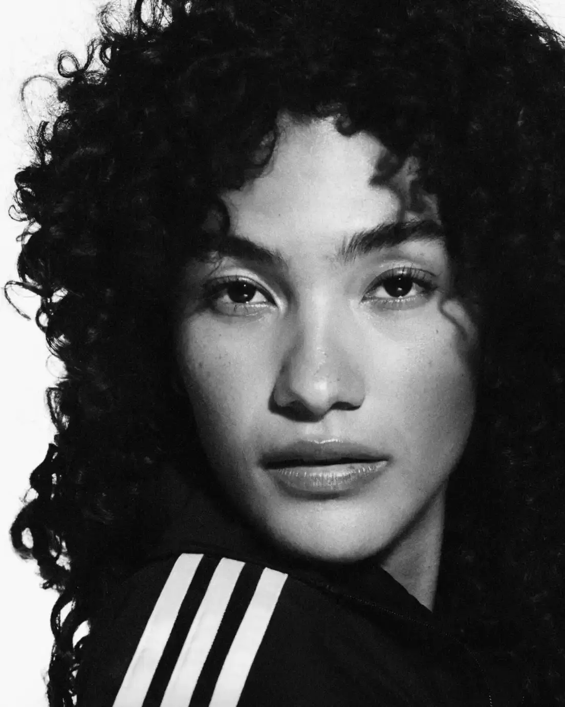 ADIDAS SUPERSTAR CAMPAIGN STARS STORMZY, BELLINGHAM, KEOGHAN image covers Adidas campaign featuring celebrities wearing iconic Superstar sneakers and Firebird tracksuits in black and white photography. (image 5 of 18)