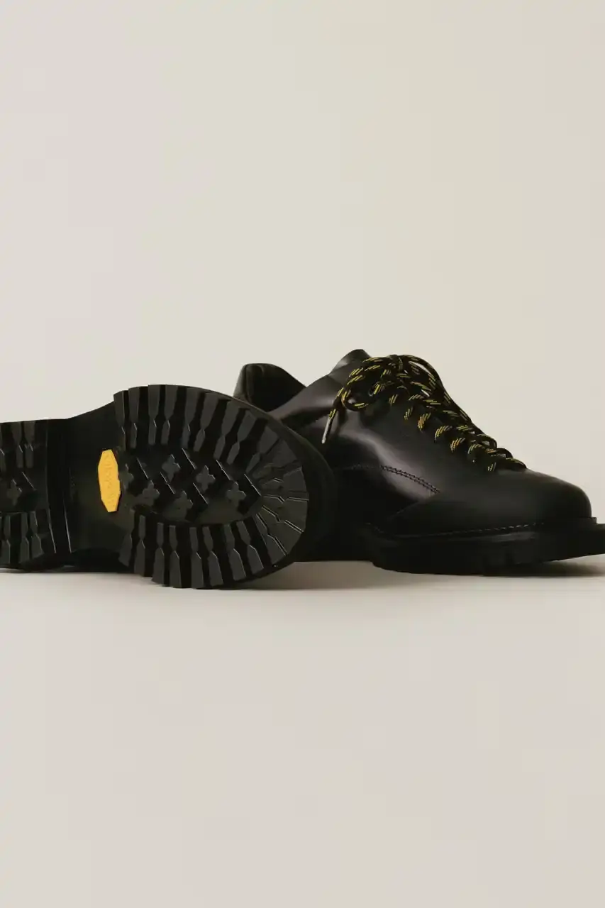 AIMÉ LEON DORE DEBUTS DERBY HIKER BOOT Aimé Leon Dore New hybrid boot combining dress shoe and hiking boot design elements, featuring premium materials and Italian construction. (image 2 of 5)