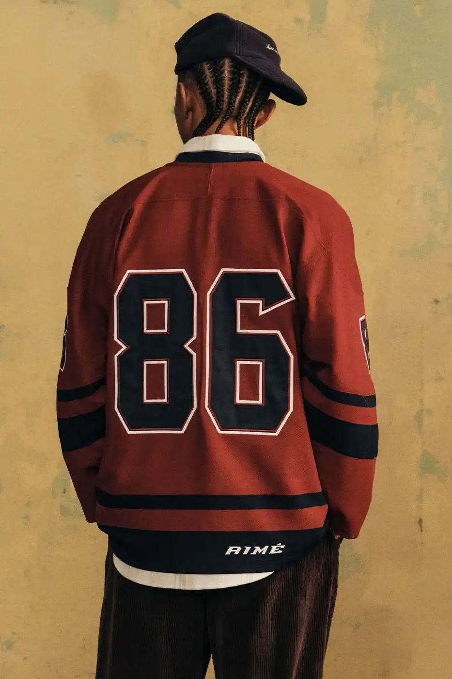 AIMÉ LEON DORE FW26 DELIVERY 2 ADDS PARKAS AND BOOTS image of Aimé Leon Dore’s Fall/Winter 2026 Delivery 2 release. It covers the outerwear, knitwear, Field Boot, New Balance sneakers, accessories and the October 9 launch details. (image 17 of 22)