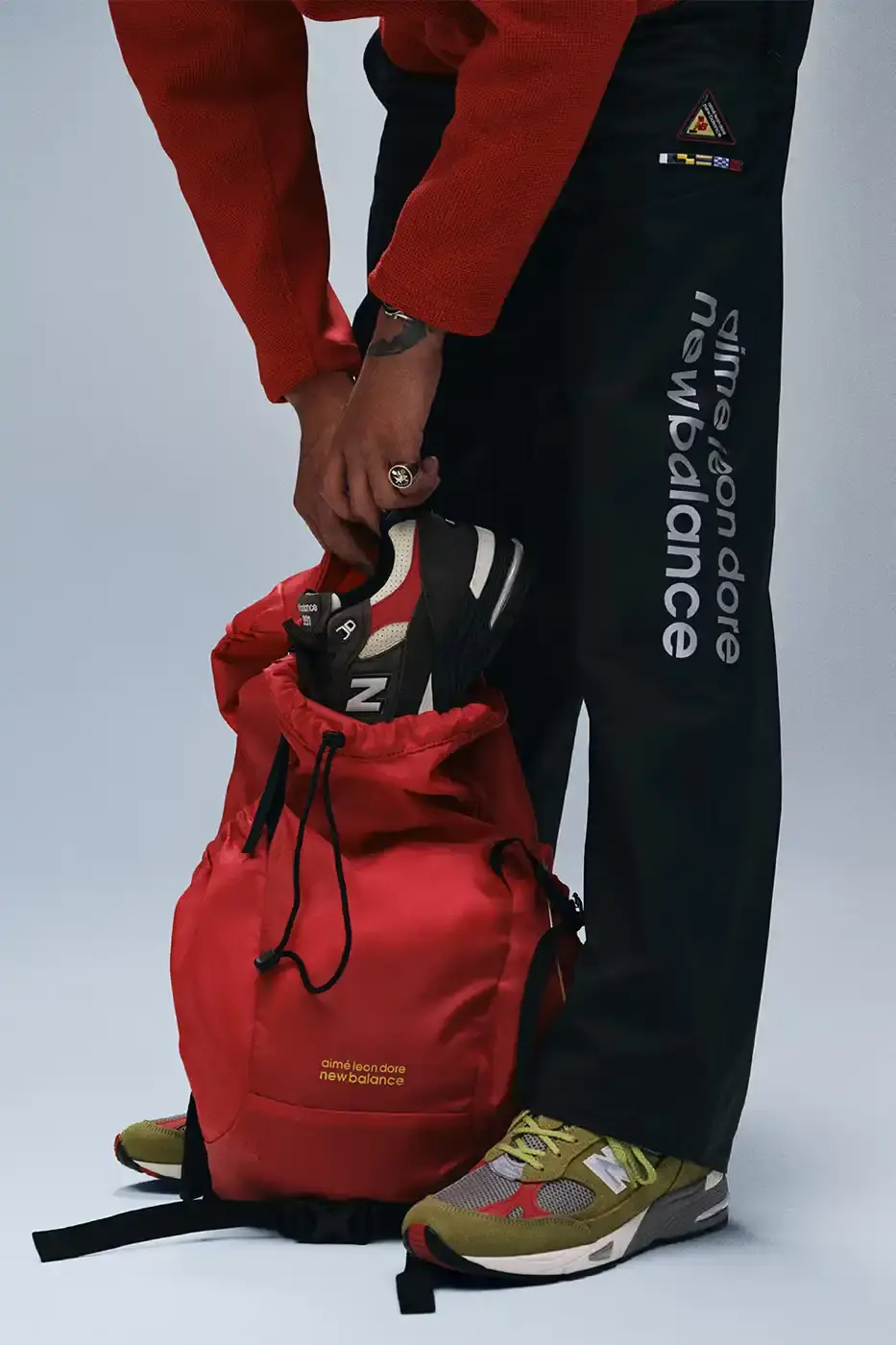 AIMÉ LEON DORE AND NEW BALANCE DROP 991 COLLECTION image about the new Aimé Leon Dore and New Balance 991 sneaker collaboration featuring two colorways and a nautical apparel line.