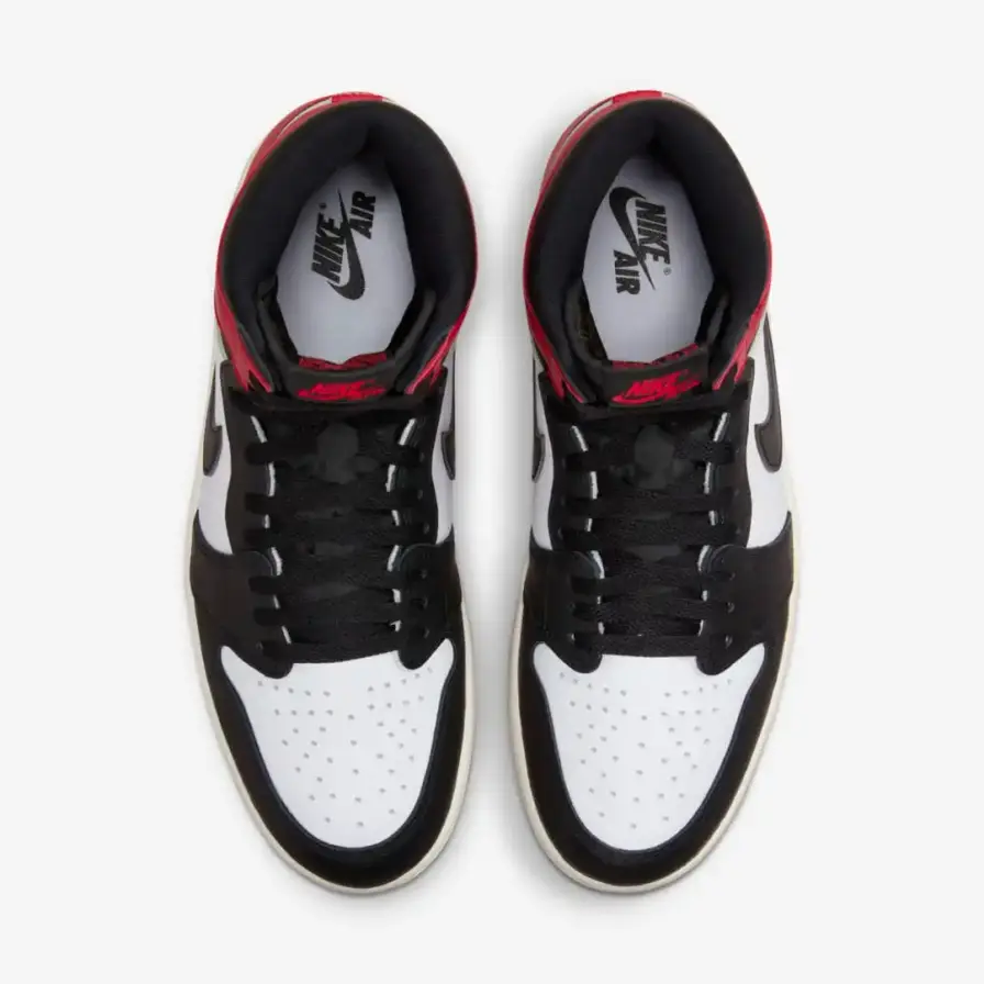 Nike Article about the Air Jordan 1 'Black Toe Reimagined' sneaker launching February 15, 2025. The shoe features white leather with black and red accents, commemorative text from Jordan's rookie season, and releases for $180 during NBA All-Star Weekend." (image 6 of 9)