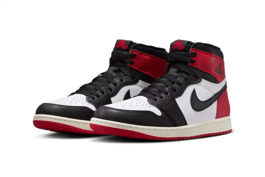 Nike Article about the Air Jordan 1 'Black Toe Reimagined' sneaker launching February 15, 2025. The shoe features white leather with black and red accents, commemorative text from Jordan's rookie season, and releases for $180 during NBA All-Star Weekend." (image 5 of 9)