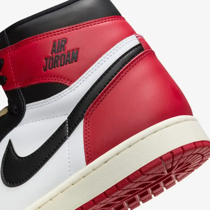 Nike Article about the Air Jordan 1 'Black Toe Reimagined' sneaker launching February 15, 2025. The shoe features white leather with black and red accents, commemorative text from Jordan's rookie season, and releases for $180 during NBA All-Star Weekend." (image 4 of 9)