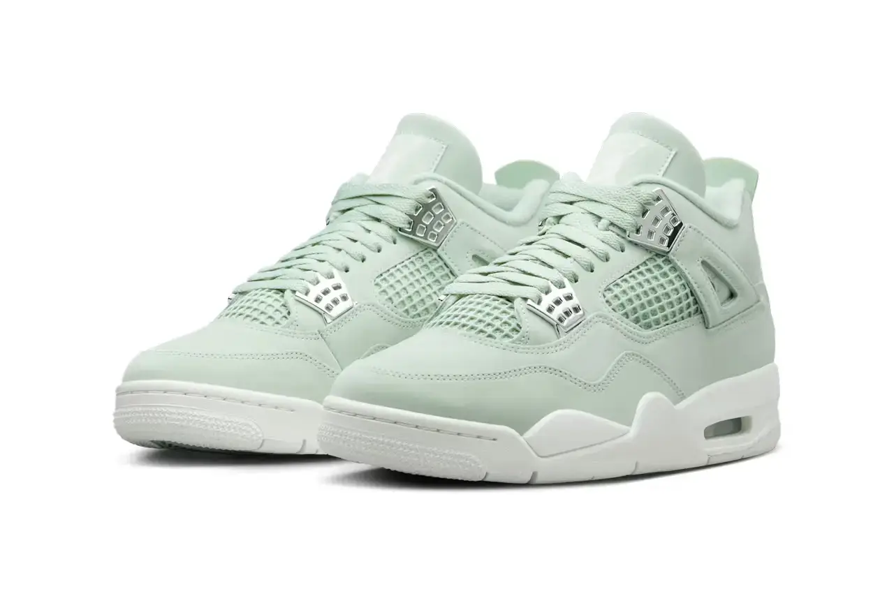 Nike Air Jordan 4 "Abundance" sneaker in monochromatic Seafoam green with Metallic Silver eyelets, featuring a sail-colored midsole and outsole. Shown from multiple angles displaying the tonal Jumpman logo on tongue and heel tab (image 3 of 7)