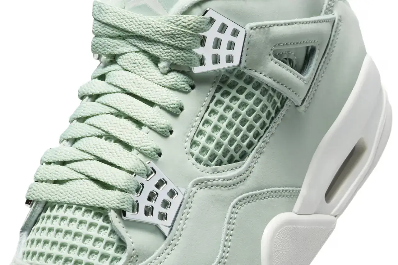 Nike Air Jordan 4 "Abundance" sneaker in monochromatic Seafoam green with Metallic Silver eyelets, featuring a sail-colored midsole and outsole. Shown from multiple angles displaying the tonal Jumpman logo on tongue and heel tab (image 6 of 7)