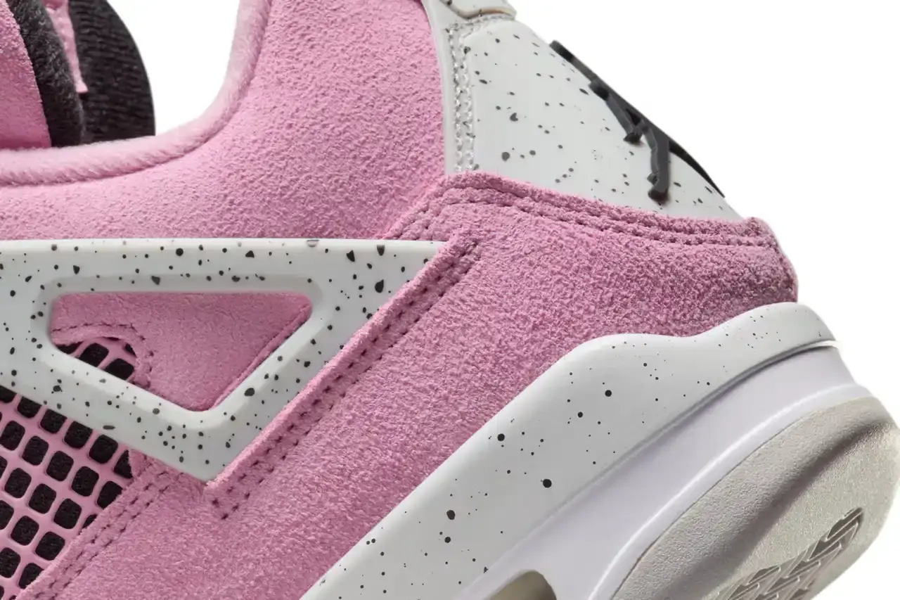 AIR JORDAN 4 "ORCHID" MAKES ITS DEBUT THIS WEEK Air Jordan 4 'Orchid' sneaker shown in three-quarter view, featuring pink suede upper with grey and black accents, white midsole, and signature AJ4 wing supports (image 7 of 7)
