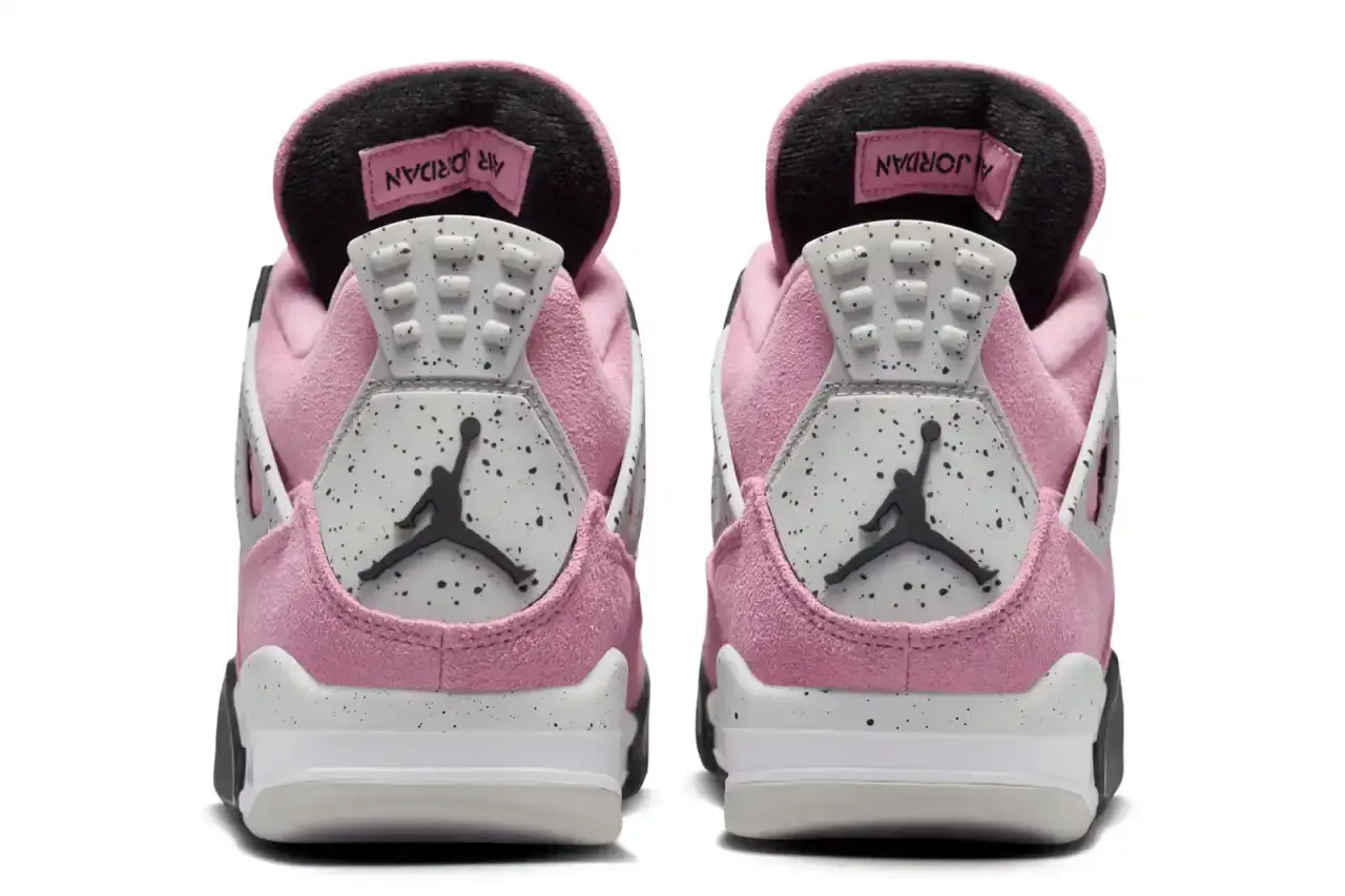 AIR JORDAN 4 "ORCHID" MAKES ITS DEBUT THIS WEEK Air Jordan 4 'Orchid' sneaker shown in three-quarter view, featuring pink suede upper with grey and black accents, white midsole, and signature AJ4 wing supports (image 5 of 7)