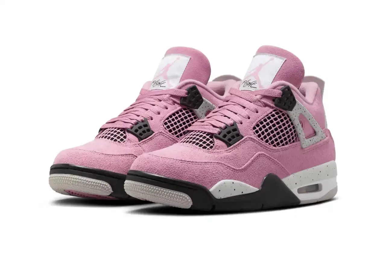AIR JORDAN 4 "ORCHID" MAKES ITS DEBUT THIS WEEK Air Jordan 4 'Orchid' sneaker shown in three-quarter view, featuring pink suede upper with grey and black accents, white midsole, and signature AJ4 wing supports (image 3 of 7)