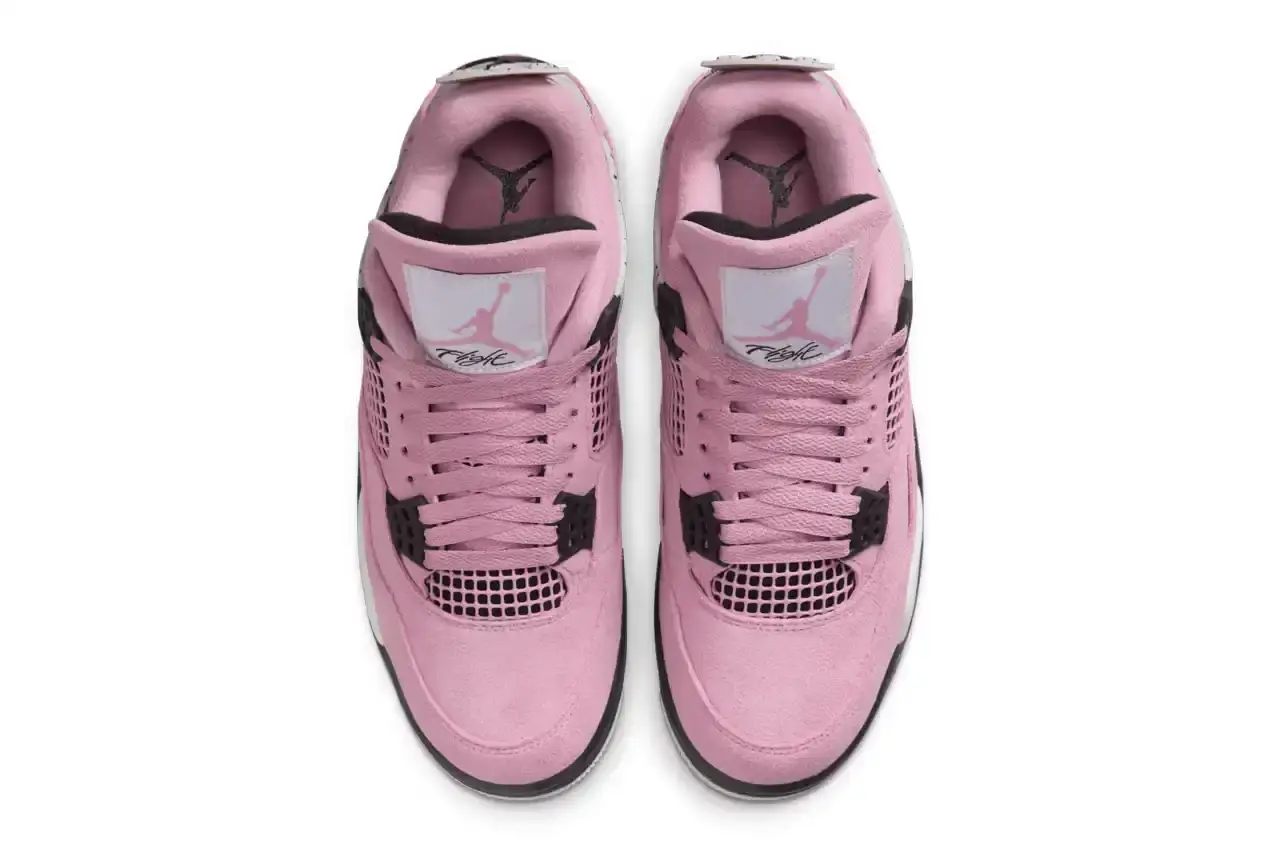 AIR JORDAN 4 "ORCHID" MAKES ITS DEBUT THIS WEEK Air Jordan 4 'Orchid' sneaker shown in three-quarter view, featuring pink suede upper with grey and black accents, white midsole, and signature AJ4 wing supports (image 4 of 7)