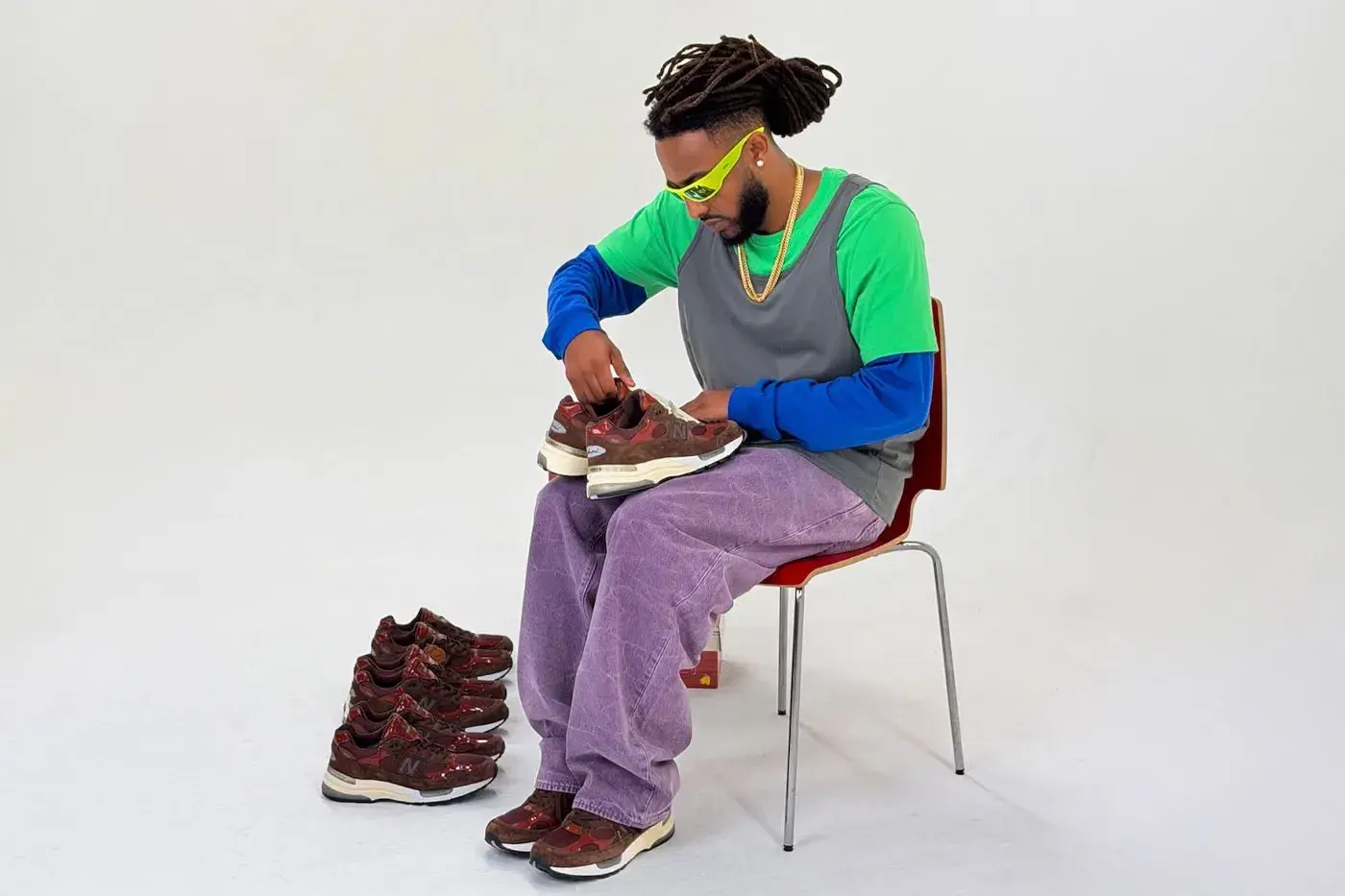 AMINÉ AND NEW BALANCE RELEASE THE 992 OUTDOOR SCHOOL image the upcoming release of the Aminé and New Balance 992 Outdoor School sneaker, detailing design features, materials, price, and release date. (image 14 of 15)