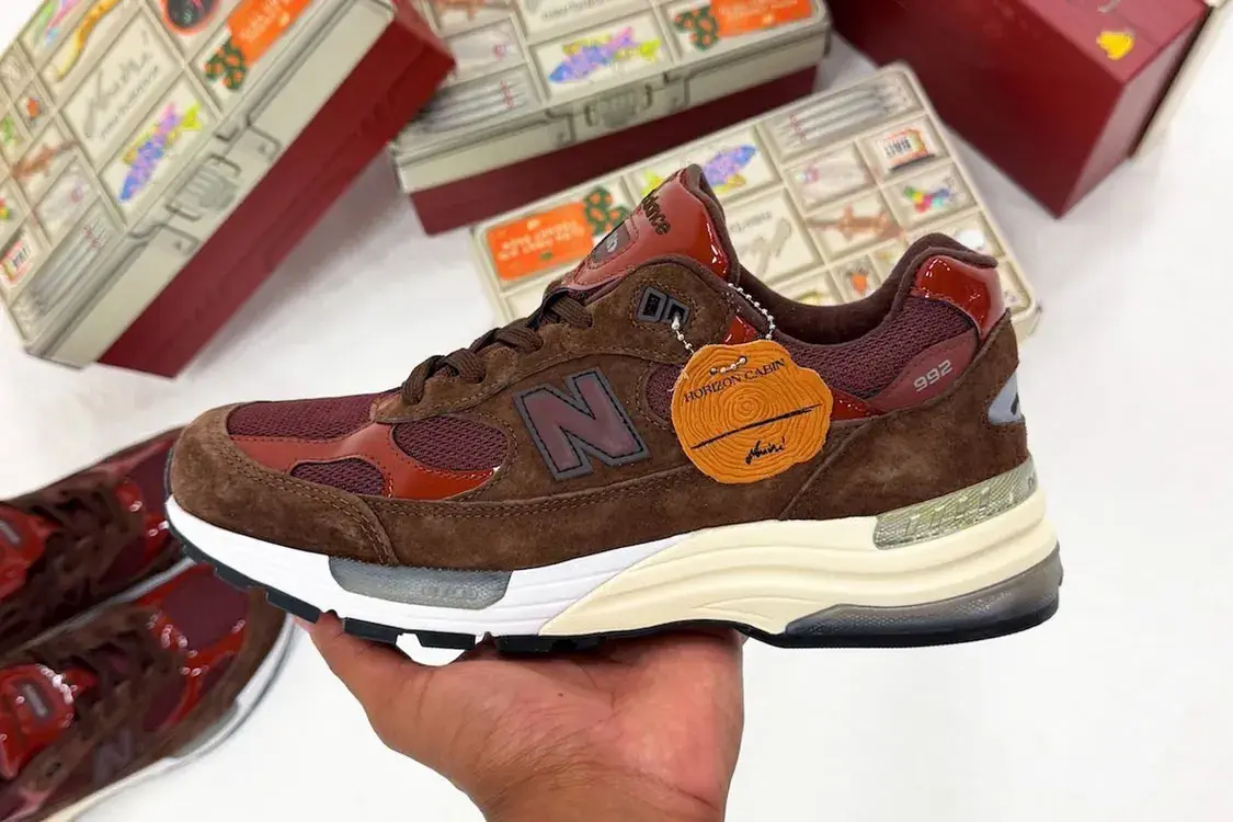 AMINÉ AND NEW BALANCE RELEASE THE 992 OUTDOOR SCHOOL image the upcoming release of the Aminé and New Balance 992 Outdoor School sneaker, detailing design features, materials, price, and release date.