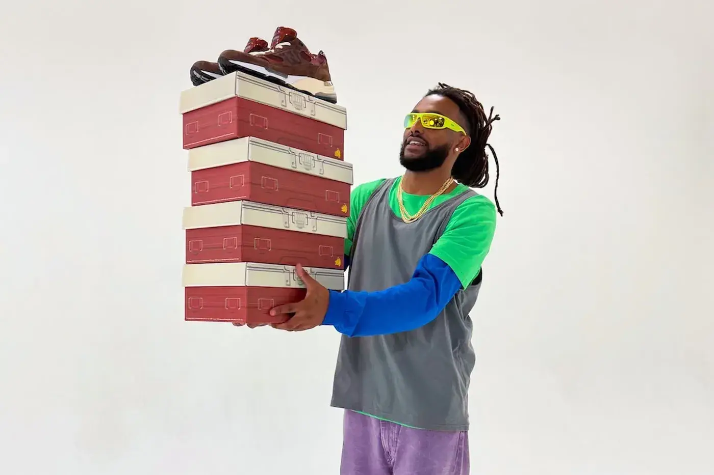AMINÉ AND NEW BALANCE RELEASE THE 992 OUTDOOR SCHOOL image the upcoming release of the Aminé and New Balance 992 Outdoor School sneaker, detailing design features, materials, price, and release date. (image 15 of 15)