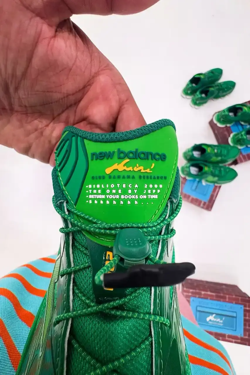 AMINÉ NEW BALANCE BIBLIOTECA 2000 OCTOBER RELEASE image about rapper Aminé's upcoming New Balance sneaker collaboration featuring acid green colorway and special library-themed packaging. (image 7 of 14)