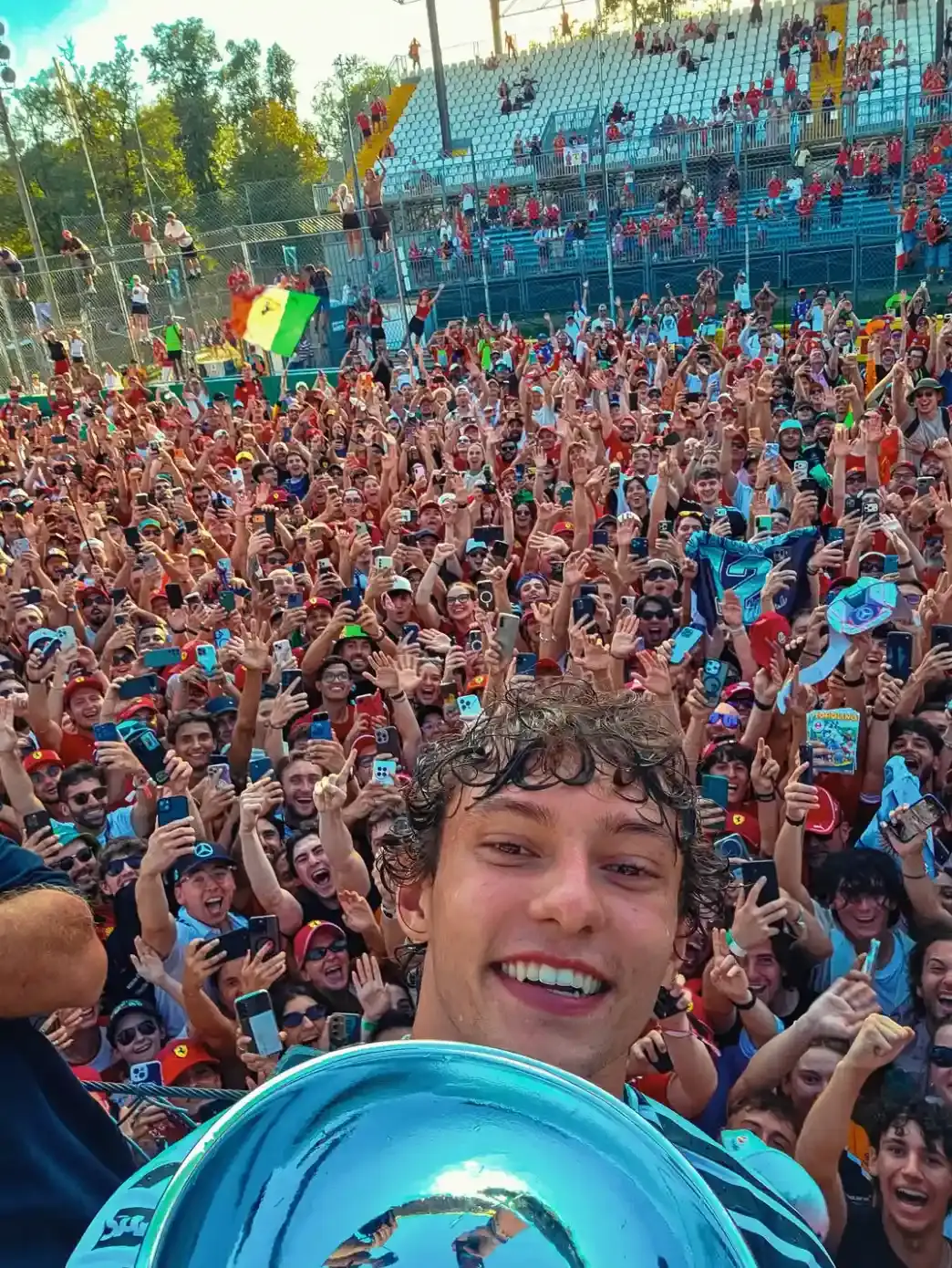A factual image report detailing Andrea Kimi Antonelli winning the Monza Formula 1 race from a 19th place starting position.