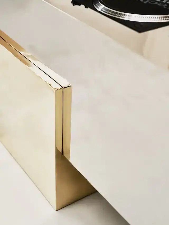 ARIELLE ASSOULINE-LICHTEN ON GLAM MINIMALISM AND DESIGN an image detailing an interview with designer Arielle of Slash Objects about her background, material choices, and new furniture collections. (image 2 of 13)