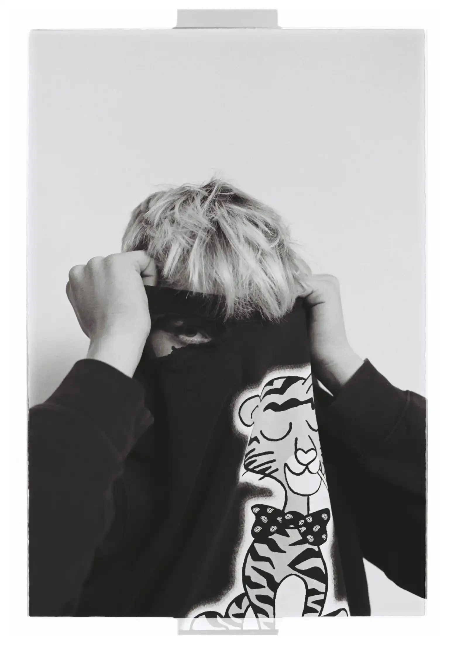 ARIES CHRONICLES A DECADE OF STREETWEAR INNOVATION photo of the Aries Arise Archive book, detailing the brand's history and significance. The content includes descriptions of the book's visual elements, collaborative works, and cultural context. The text is structured to be screen reader-friendly, with clear headings and descriptive language that conveys the visual and cultural aspects of the Aries brand for users who may not be able to see the images directly.