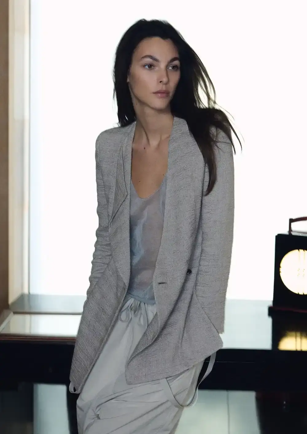 ARMANI'S FINAL COLLECTION SHOT IN HIS MILAN HOME Oliver Hadlee Pearch photographed Giorgio Armani's final collection inside the designer's Milan home, featuring models Vittoria Ceretti, Clement Chabernaud, and others among personal objects and artworks. (image 7 of 20)