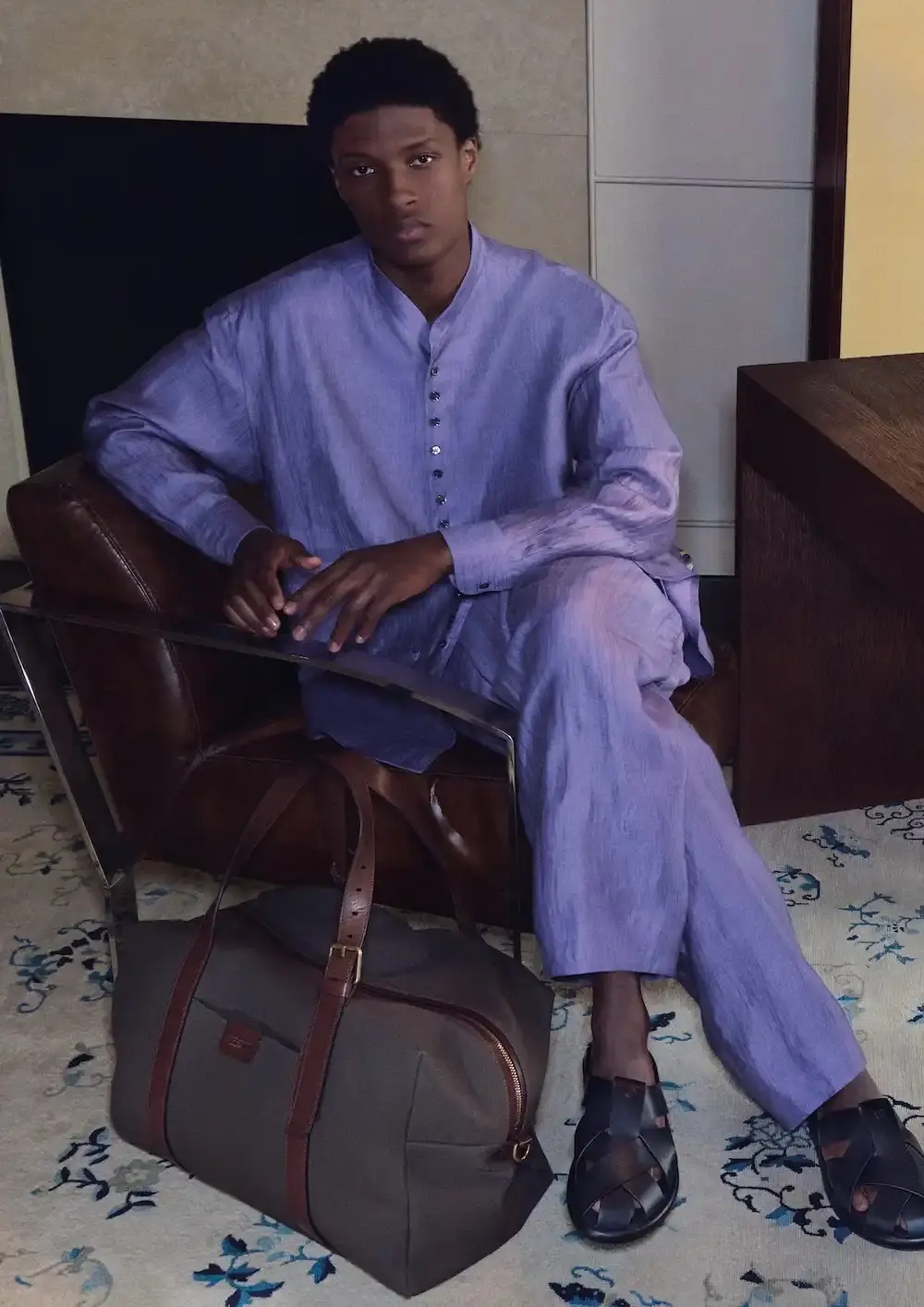 ARMANI'S FINAL COLLECTION SHOT IN HIS MILAN HOME Oliver Hadlee Pearch photographed Giorgio Armani's final collection inside the designer's Milan home, featuring models Vittoria Ceretti, Clement Chabernaud, and others among personal objects and artworks. (image 11 of 20)