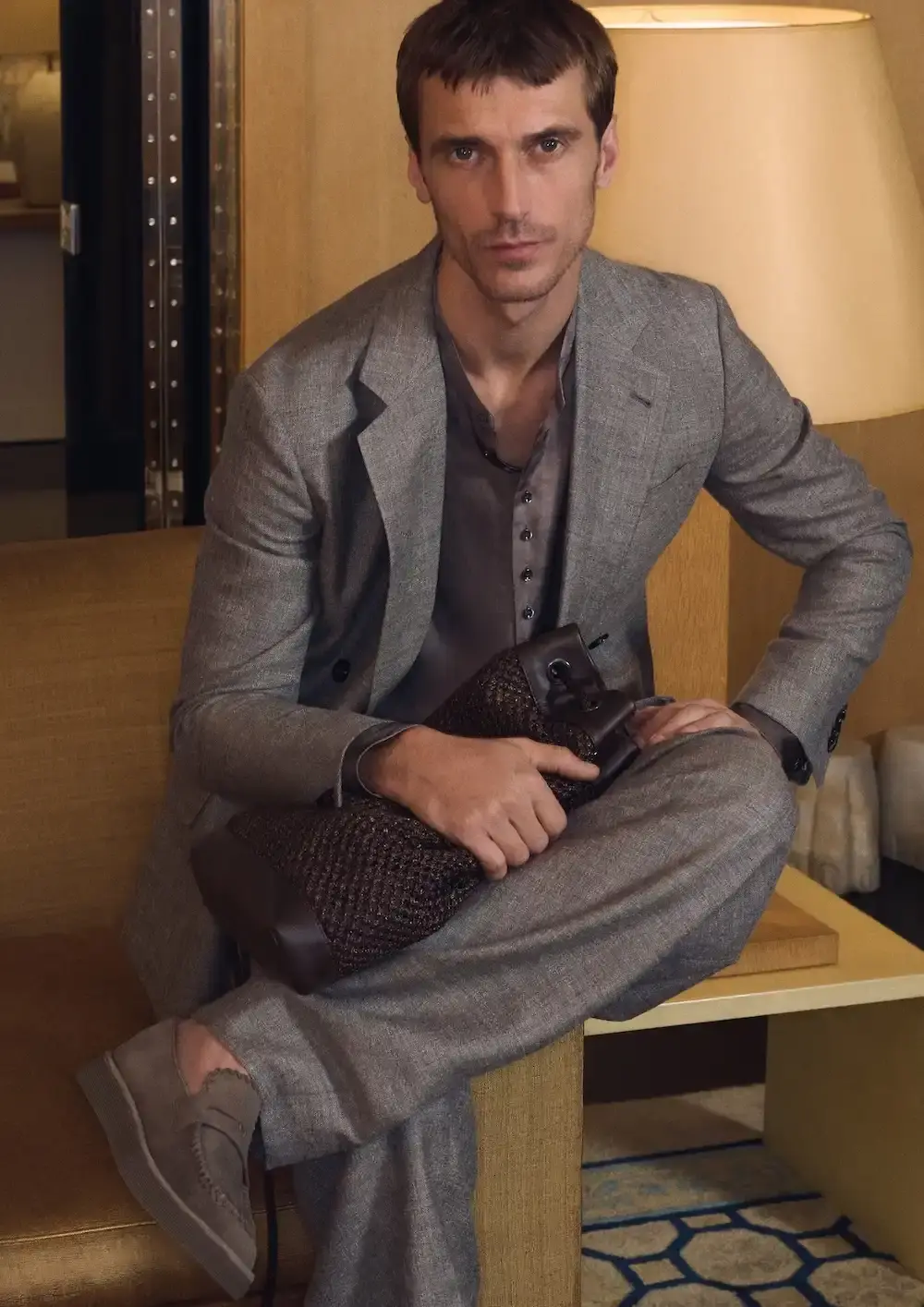 ARMANI'S FINAL COLLECTION SHOT IN HIS MILAN HOME Oliver Hadlee Pearch photographed Giorgio Armani's final collection inside the designer's Milan home, featuring models Vittoria Ceretti, Clement Chabernaud, and others among personal objects and artworks. (image 10 of 20)