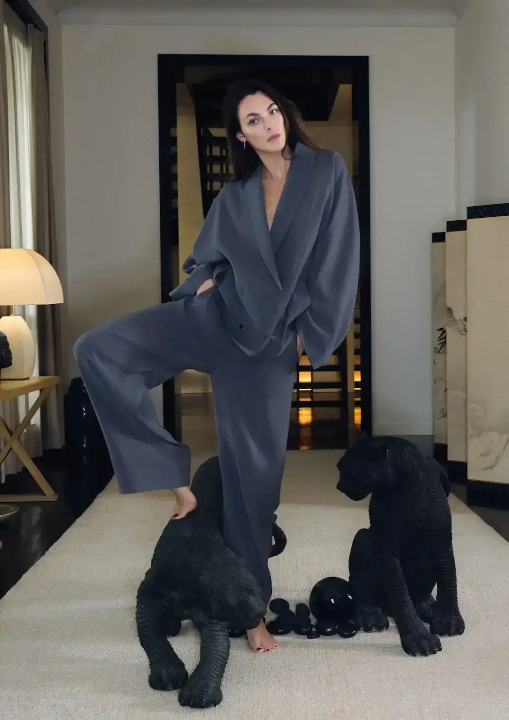 ARMANI'S FINAL COLLECTION SHOT IN HIS MILAN HOME Oliver Hadlee Pearch photographed Giorgio Armani's final collection inside the designer's Milan home, featuring models Vittoria Ceretti, Clement Chabernaud, and others among personal objects and artworks. (image 5 of 20)