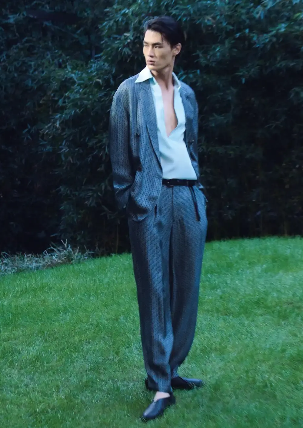 ARMANI'S FINAL COLLECTION SHOT IN HIS MILAN HOME Oliver Hadlee Pearch photographed Giorgio Armani's final collection inside the designer's Milan home, featuring models Vittoria Ceretti, Clement Chabernaud, and others among personal objects and artworks. (image 13 of 20)