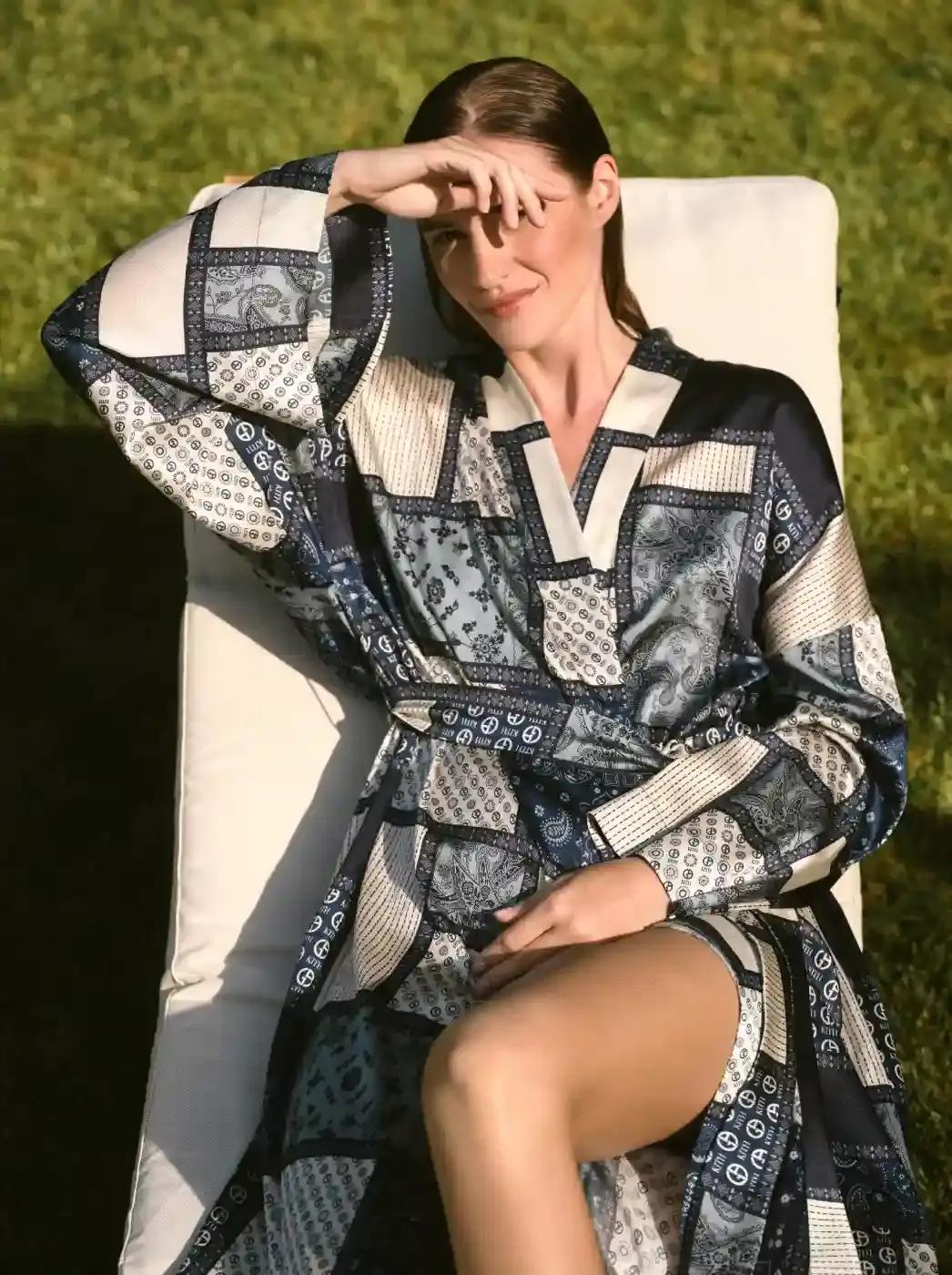 ARMANI & KITH LAUNCH SECOND COLLECTION image of the second Giorgio Armani and Kith collaborative fashion collection called "Estate." The collection includes both men's and women's clothing and accessories inspired by coastal destinations in Italy and America. Key details include product descriptions, materials used, launch dates, and availability information across multiple retail channels. (image 7 of 9)