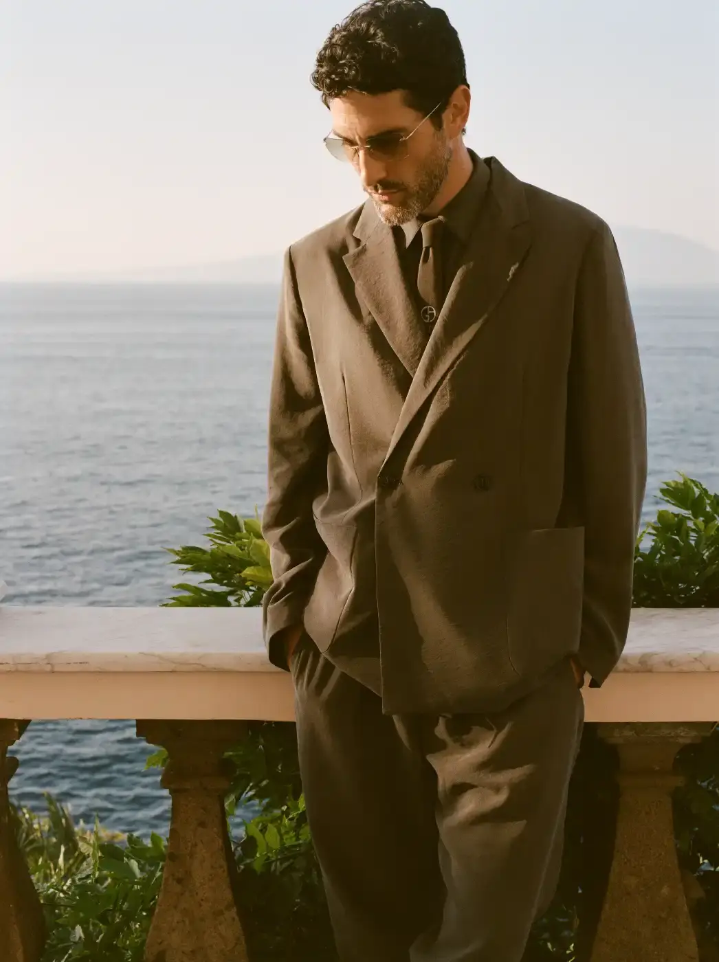 ARMANI & KITH LAUNCH SECOND COLLECTION image of the second Giorgio Armani and Kith collaborative fashion collection called "Estate." The collection includes both men's and women's clothing and accessories inspired by coastal destinations in Italy and America. Key details include product descriptions, materials used, launch dates, and availability information across multiple retail channels.