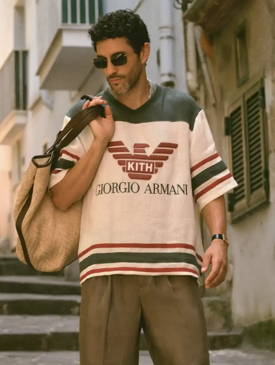 ARMANI & KITH LAUNCH SECOND COLLECTION image of the second Giorgio Armani and Kith collaborative fashion collection called "Estate." The collection includes both men's and women's clothing and accessories inspired by coastal destinations in Italy and America. Key details include product descriptions, materials used, launch dates, and availability information across multiple retail channels. (image 6 of 9)