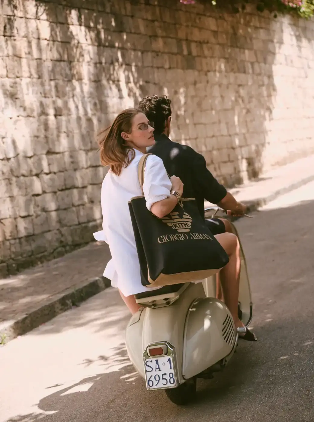 ARMANI & KITH LAUNCH SECOND COLLECTION image of the second Giorgio Armani and Kith collaborative fashion collection called "Estate." The collection includes both men's and women's clothing and accessories inspired by coastal destinations in Italy and America. Key details include product descriptions, materials used, launch dates, and availability information across multiple retail channels. (image 9 of 9)