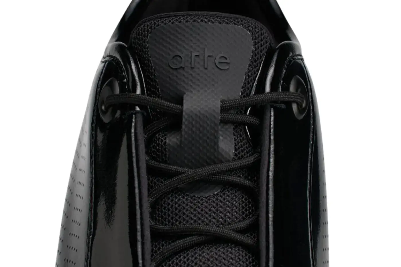 ARTE ANTWERP ADIDAS F50 PATENT LEATHER image overview of the Arte Antwerp and adidas F50 sneaker release in black patent leather detailing product features, pricing, and launch dates. (image 7 of 7)