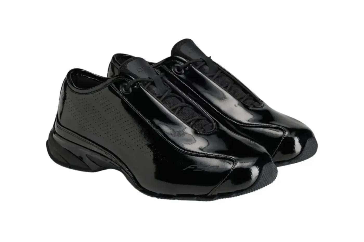 ARTE ANTWERP ADIDAS F50 PATENT LEATHER image overview of the Arte Antwerp and adidas F50 sneaker release in black patent leather detailing product features, pricing, and launch dates. (image 3 of 7)