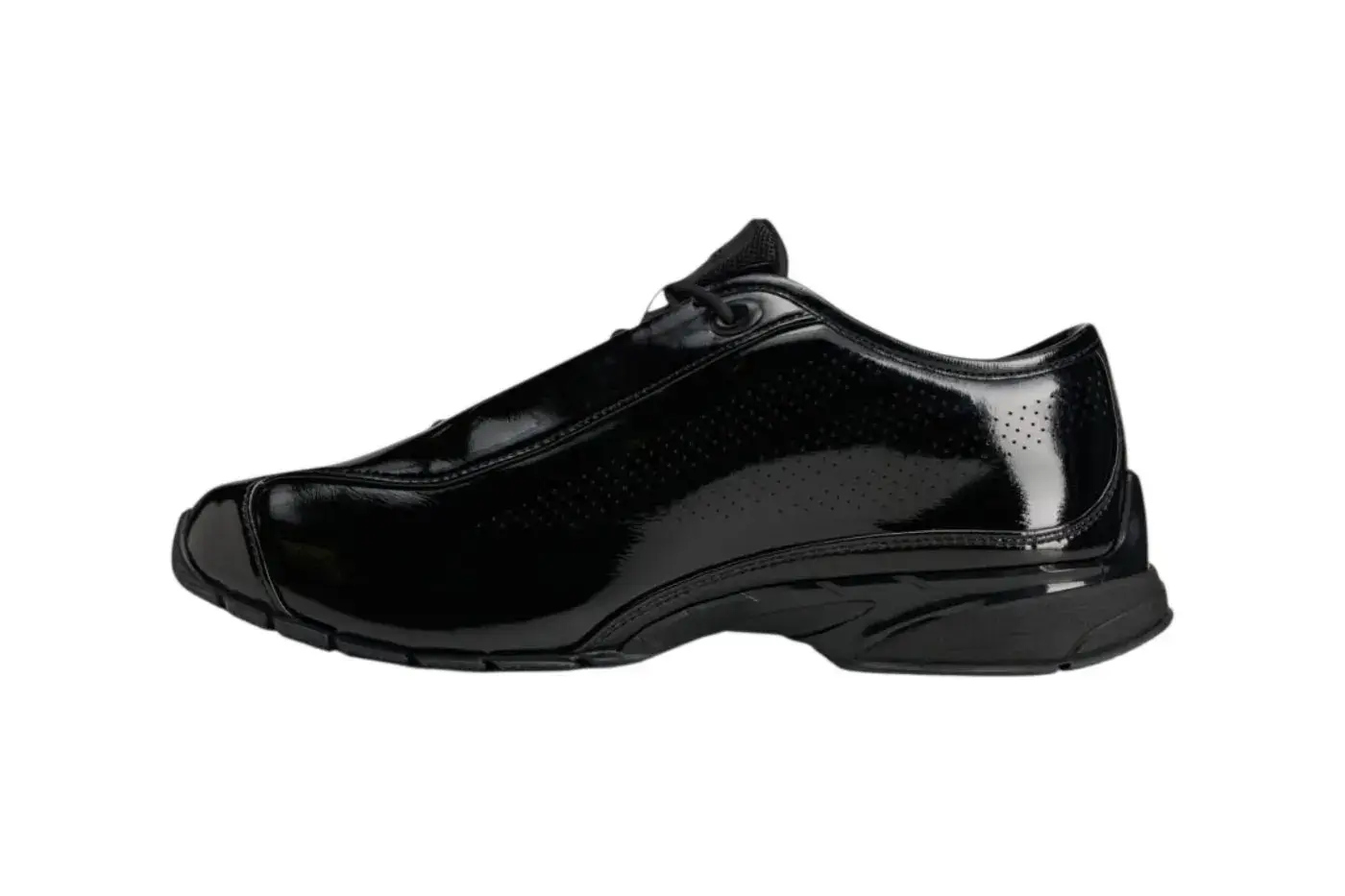 ARTE ANTWERP ADIDAS F50 PATENT LEATHER image overview of the Arte Antwerp and adidas F50 sneaker release in black patent leather detailing product features, pricing, and launch dates. (image 2 of 7)