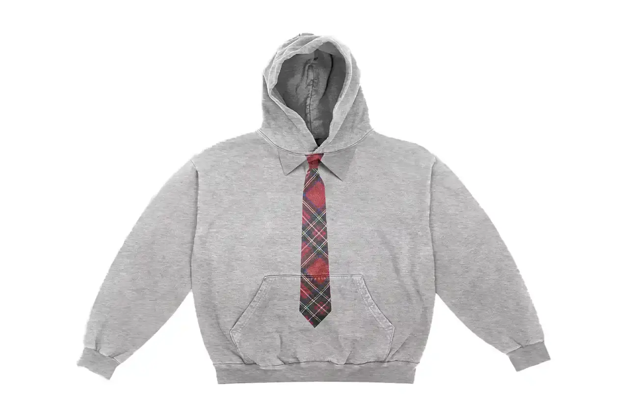A$AP ROCKY'S AWGE COLLECTION NOW AVAILABLE THROUGH CASH APP image reports on a retail collaboration between musician A$AP Rocky and Cash App. It describes clothing items and accessories from Rocky's AWGE collection now available through Cash App's Afterpay service, including a parka he wore to the Met Gala, designer hoodies, and a diamond-studded brooch. The article provides price range information ($50-$4,000) and notes the items are available in limited quantities through AWGE's website. (image 2 of 9)