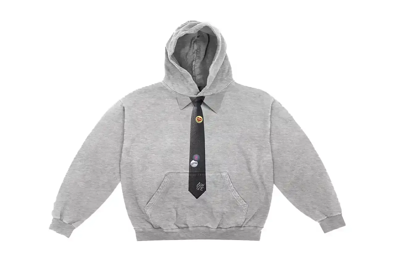 A$AP ROCKY'S AWGE COLLECTION NOW AVAILABLE THROUGH CASH APP image reports on a retail collaboration between musician A$AP Rocky and Cash App. It describes clothing items and accessories from Rocky's AWGE collection now available through Cash App's Afterpay service, including a parka he wore to the Met Gala, designer hoodies, and a diamond-studded brooch. The article provides price range information ($50-$4,000) and notes the items are available in limited quantities through AWGE's website. (image 3 of 9)