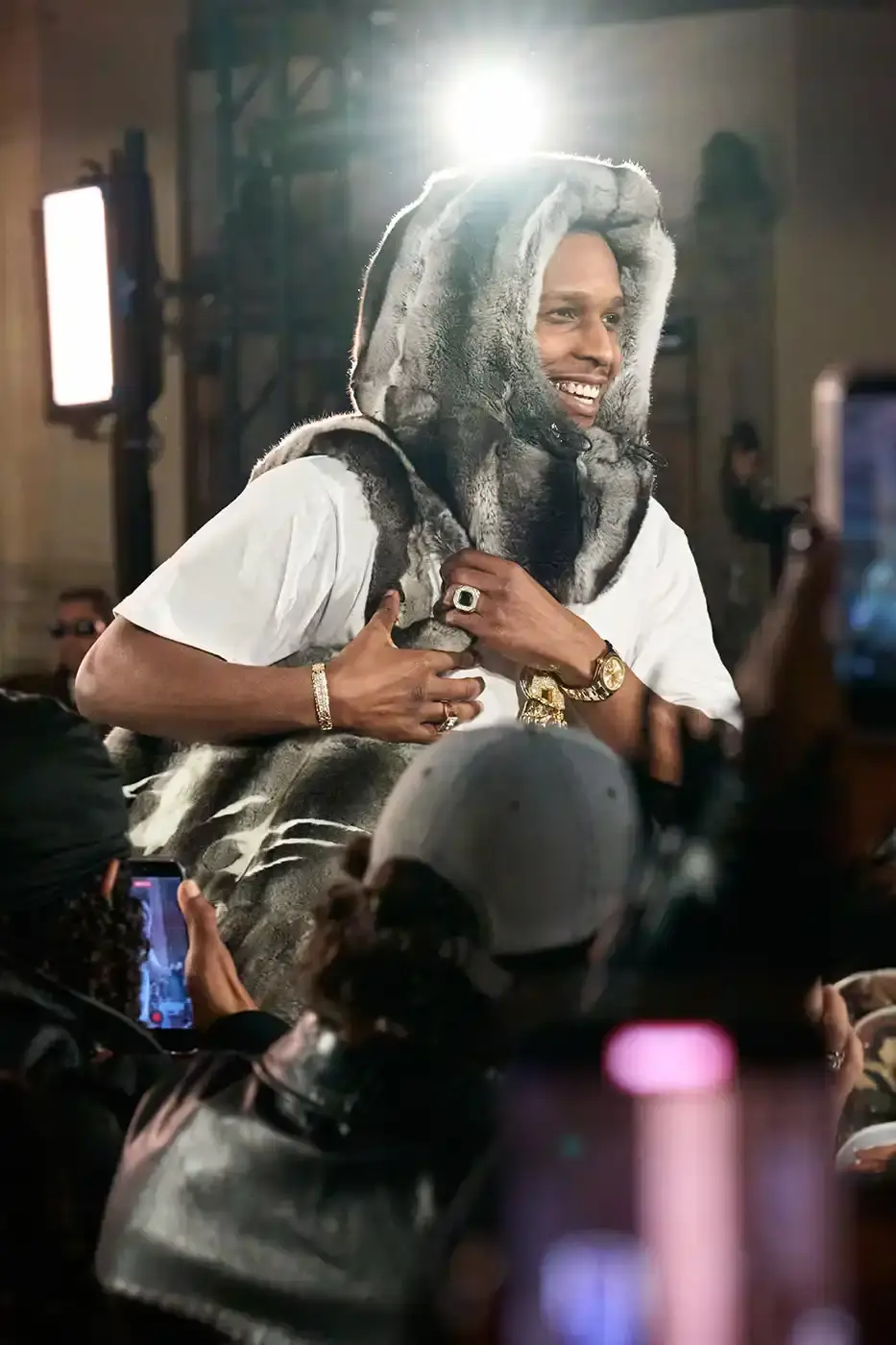 A$AP ROCKY TURNS BACKSTAGE INTO RUNWAY AT NYFW AWGE presented its Fall/Winter 2026 collection at New York Fashion Week with models receiving hair and makeup on the runway. The show featured baby carriers, motorsport aesthetics, and new A$AP Rocky x PUMA footwear releases. (image 41 of 41)