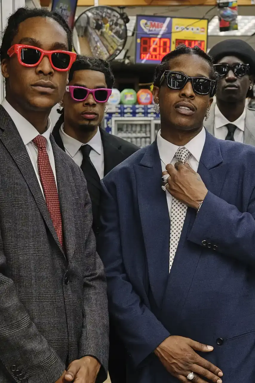 ROCKY UNVEILS RAY-BAN WAYFARER PUFFER COLLECTION image about A$AP Rocky's new Ray-Ban sunglasses collection. The Wayfarer Puffer frames come in seven colors and cost $202 each. The advertising campaign was photographed in Harlem using local residents as models. Rocky became Ray-Ban's Creative Director in February and previously wore custom versions of these sunglasses to the Met Gala and Cannes Film Festival.