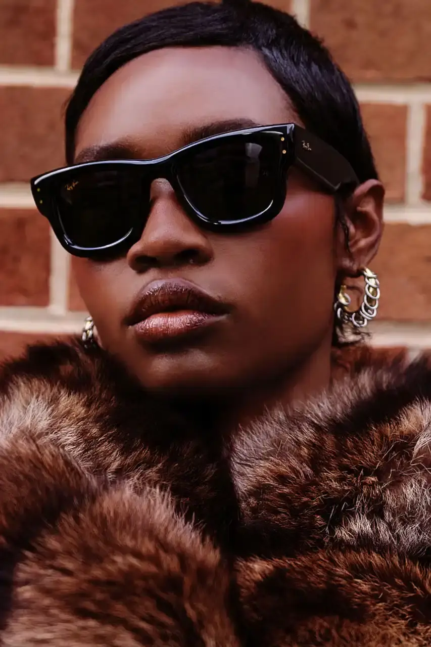 ROCKY UNVEILS RAY-BAN WAYFARER PUFFER COLLECTION image about A$AP Rocky's new Ray-Ban sunglasses collection. The Wayfarer Puffer frames come in seven colors and cost $202 each. The advertising campaign was photographed in Harlem using local residents as models. Rocky became Ray-Ban's Creative Director in February and previously wore custom versions of these sunglasses to the Met Gala and Cannes Film Festival. (image 2 of 10)