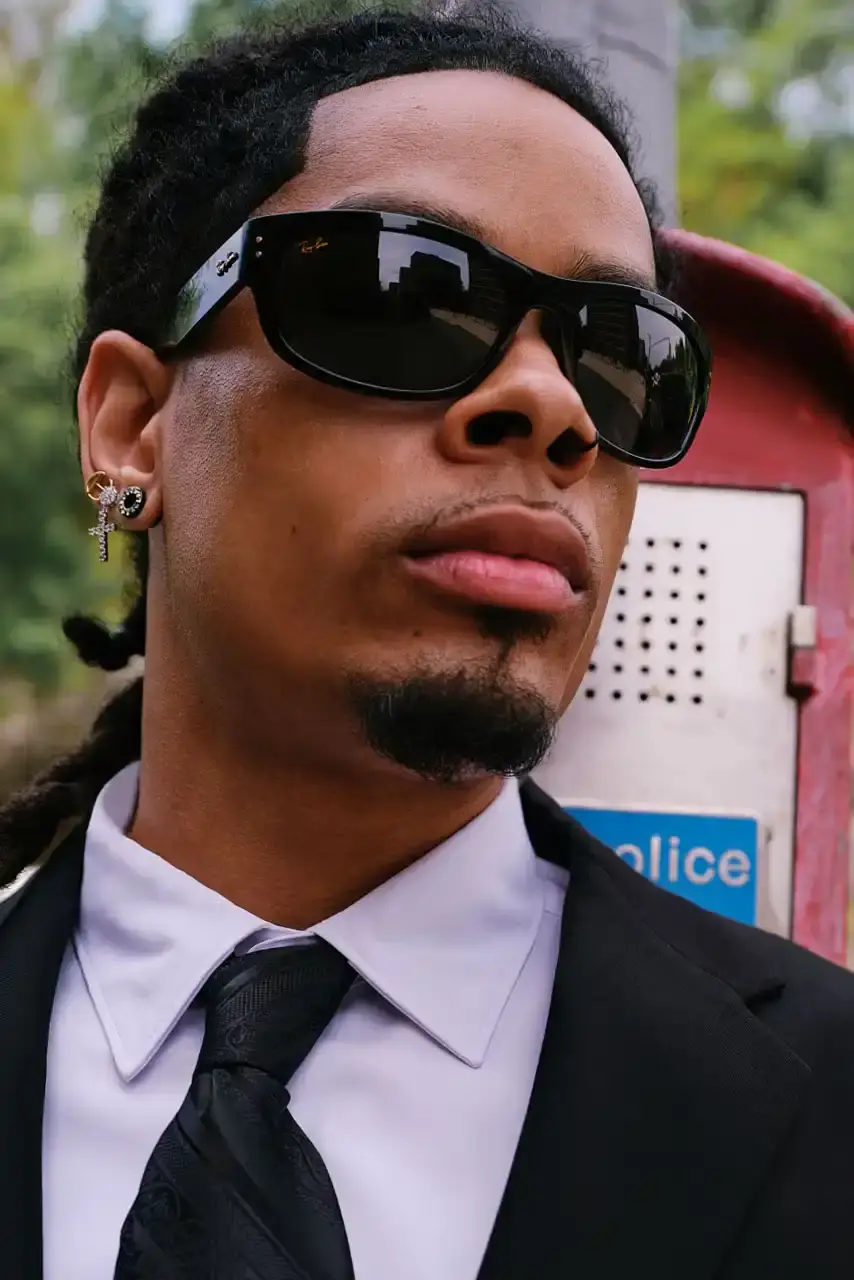ROCKY UNVEILS RAY-BAN WAYFARER PUFFER COLLECTION image about A$AP Rocky's new Ray-Ban sunglasses collection. The Wayfarer Puffer frames come in seven colors and cost $202 each. The advertising campaign was photographed in Harlem using local residents as models. Rocky became Ray-Ban's Creative Director in February and previously wore custom versions of these sunglasses to the Met Gala and Cannes Film Festival. (image 8 of 10)
