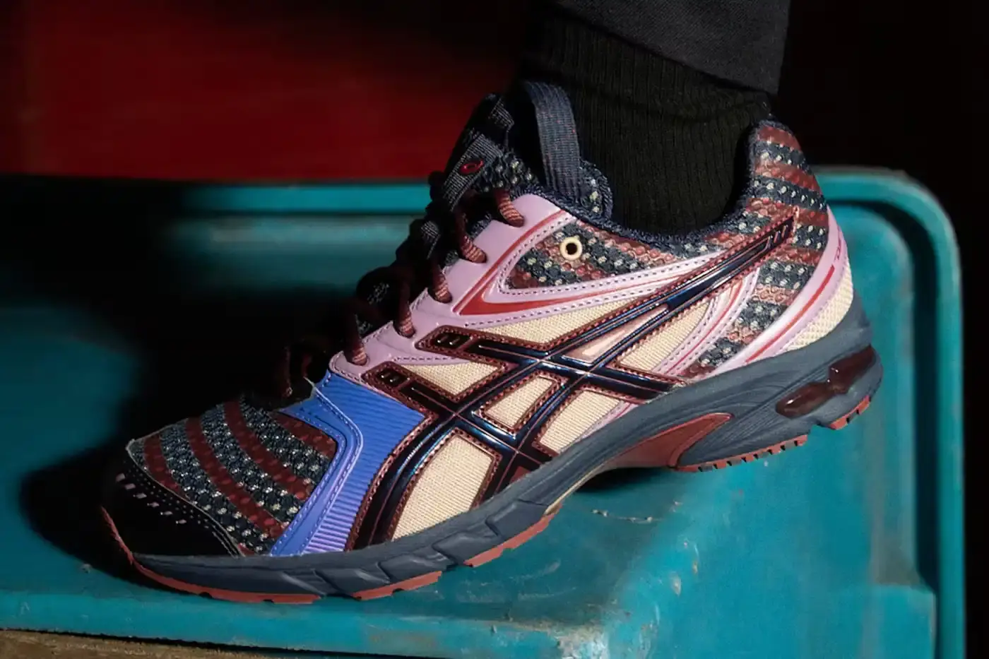 Asics ASICS GEL-DS Trainer 14 sneaker designed by Kiko Kostadinov, showing asymmetrical lacing system and multi-textured upper in gradient colorways. Four shoes displayed featuring Waterfall, Desert Camp, Dark Mustard, and Midnight color combinations. (image 3 of 4)