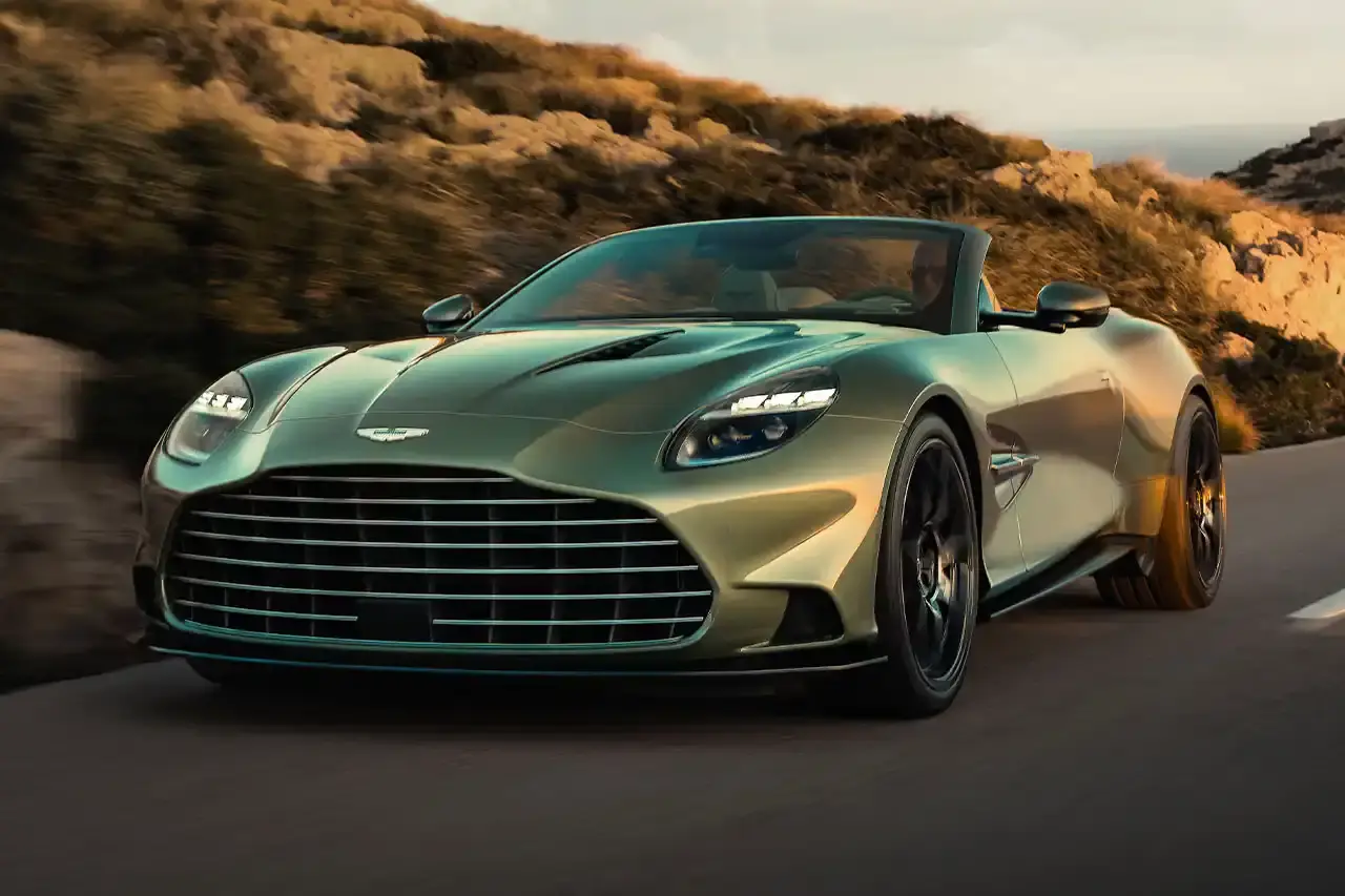 ASTON MARTIN LAUNCHES LIMITED-EDITION VANQUISH VOLANTE The Aston Martin Vanquish Volante is a high-performance convertible featuring a 5.2L V12 engine, advanced engineering, and a luxurious interior. Limited to under 1,000 units annually, it represents a pinnacle of automotive design and technological innovation.